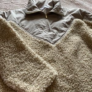 Two pair of fleece sweaters